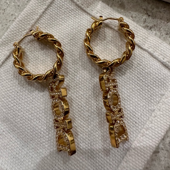 White crystals, 'DIOR' signature, gold-finish metal, hook clasp, sold as a pair. - Picture 2 of 6